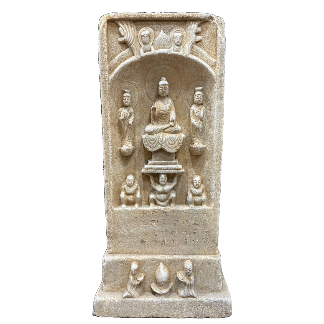 Han white jade intricately carved with one Buddha and two disciples. (1 of 10)