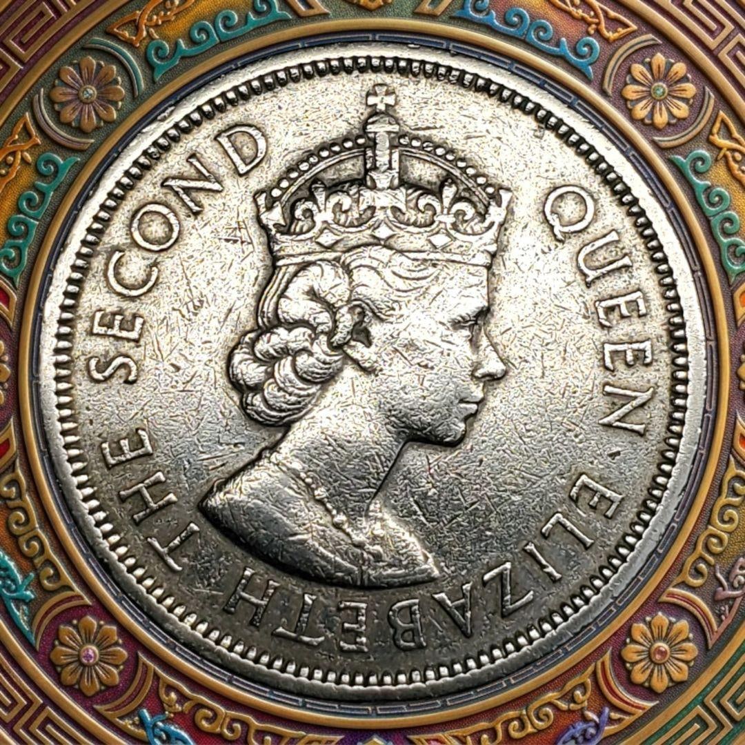 Antique big flower from British Hong Kong during the Elizabeth II era in 1960.: Hong Kong (British Territory)Queen Elizabeth II (1952–1997)Type: Standard circulation coin1960-1970Value of 1 dollar (1 Hong Kong dollar)Currency is the dollar (1863-present).Composition: Cupronicke