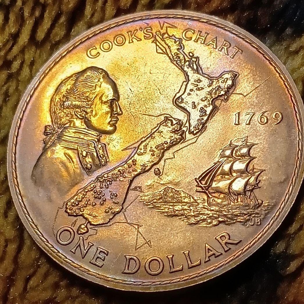 1969 New Zealand 1 dollar commemorative coin: 1969 New Zealand 1 dollar commemorative coinMaterial: Cupronickel (copper-nickel alloy).Size: Approximately 38.7 millimeters to 38.8 millimeters in diameter.Weight: Approximately 27.2 grams to 28.3 gr