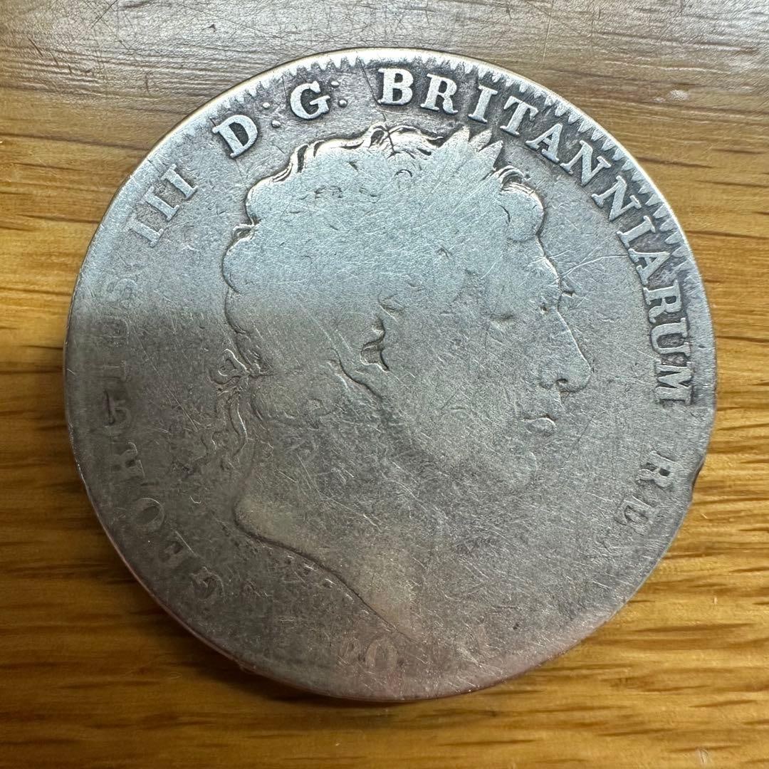 1820 Kronenthaler silver coin: This is a silver coin issued in 1820.