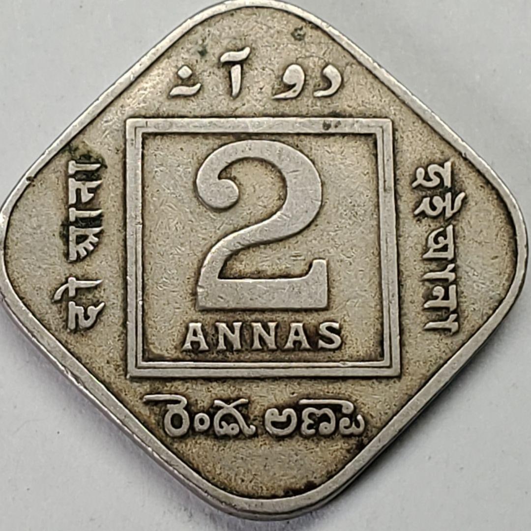 British India 2 Annas 1919 King George V Silhouette: Issued by India - British (British India)King George V (1910-1936)Type: Standard circulation coin1918-1936Value: 2 Annas (1/8)Currency: Rupee (1862-1947)Composition: Copper, NickelWeight: 5.7 gramsDia
