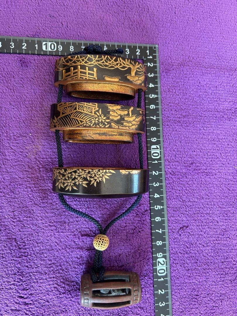 The box is decorated with landscape patterns. - 11