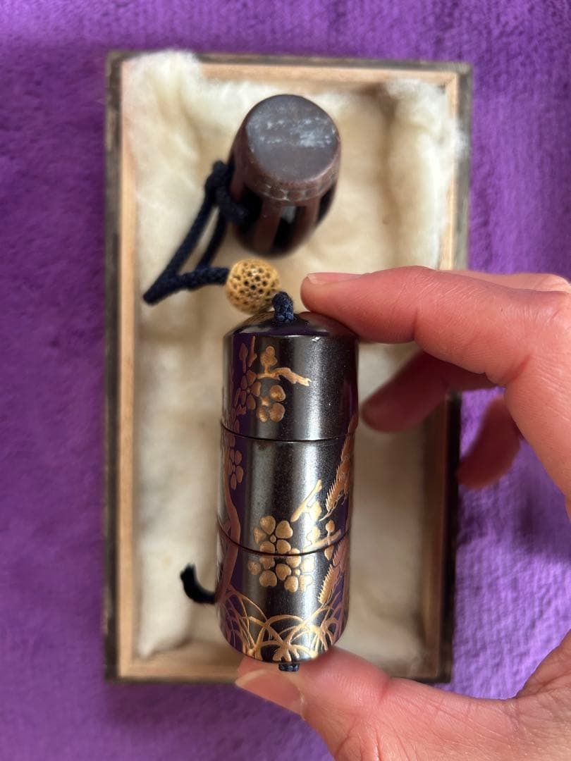 The box is decorated with landscape patterns. - 4