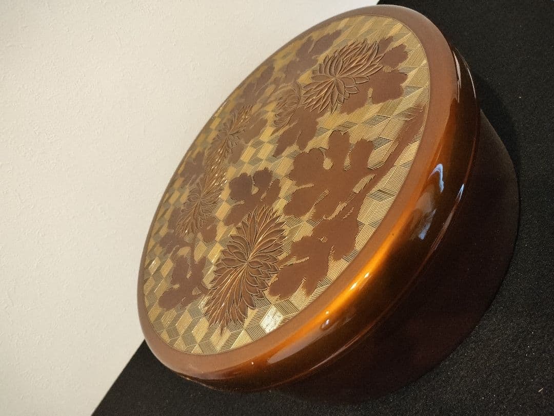Brown lacquerware with floral pattern. - 2