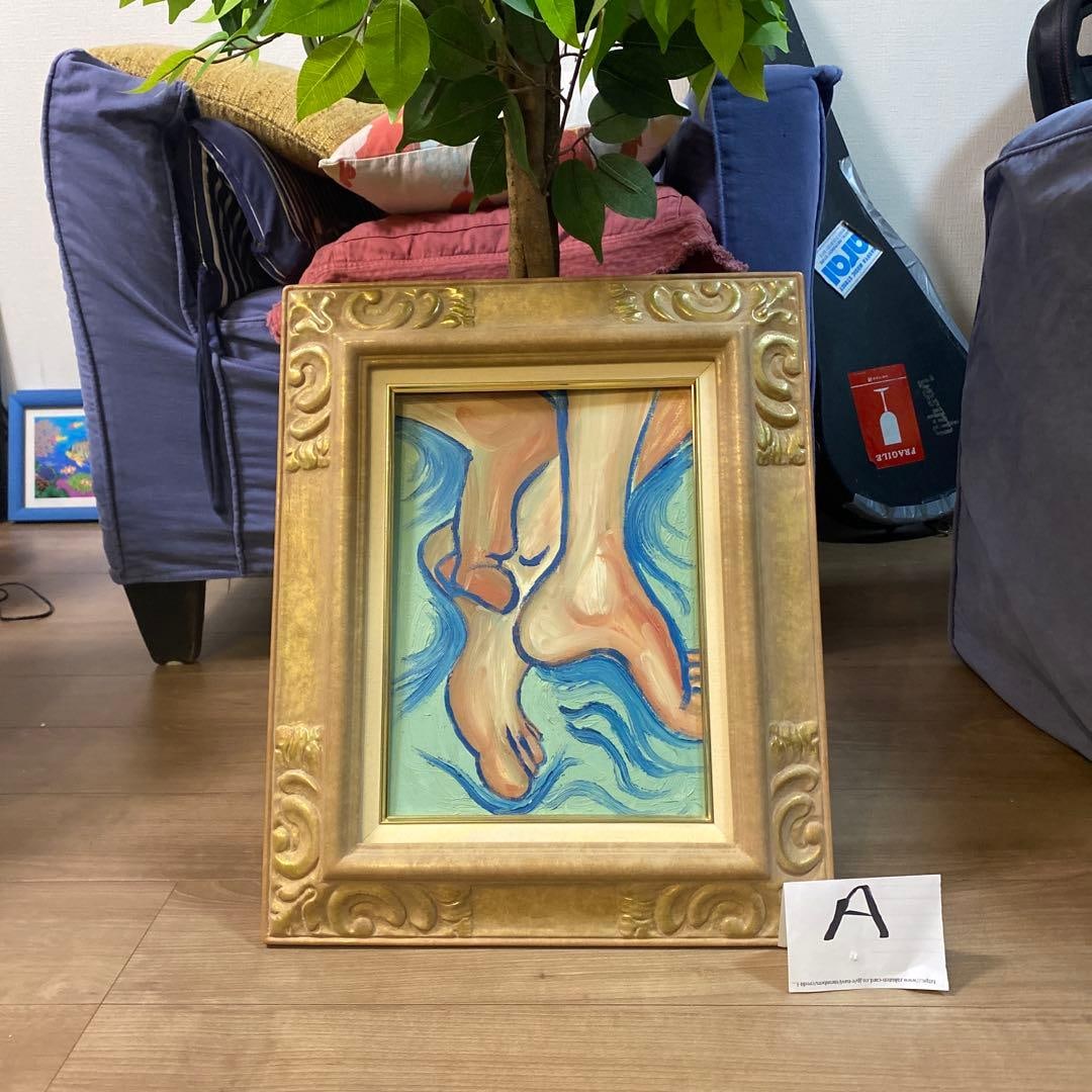 A painting of a foot, framed in gold.: An Impressionist oil painting with feet as the main theme, framed in a decorative gold frame.Theme of the painting: FeetFrame color: GoldPainting style: ImpressionistBackground color: BlueFrame design