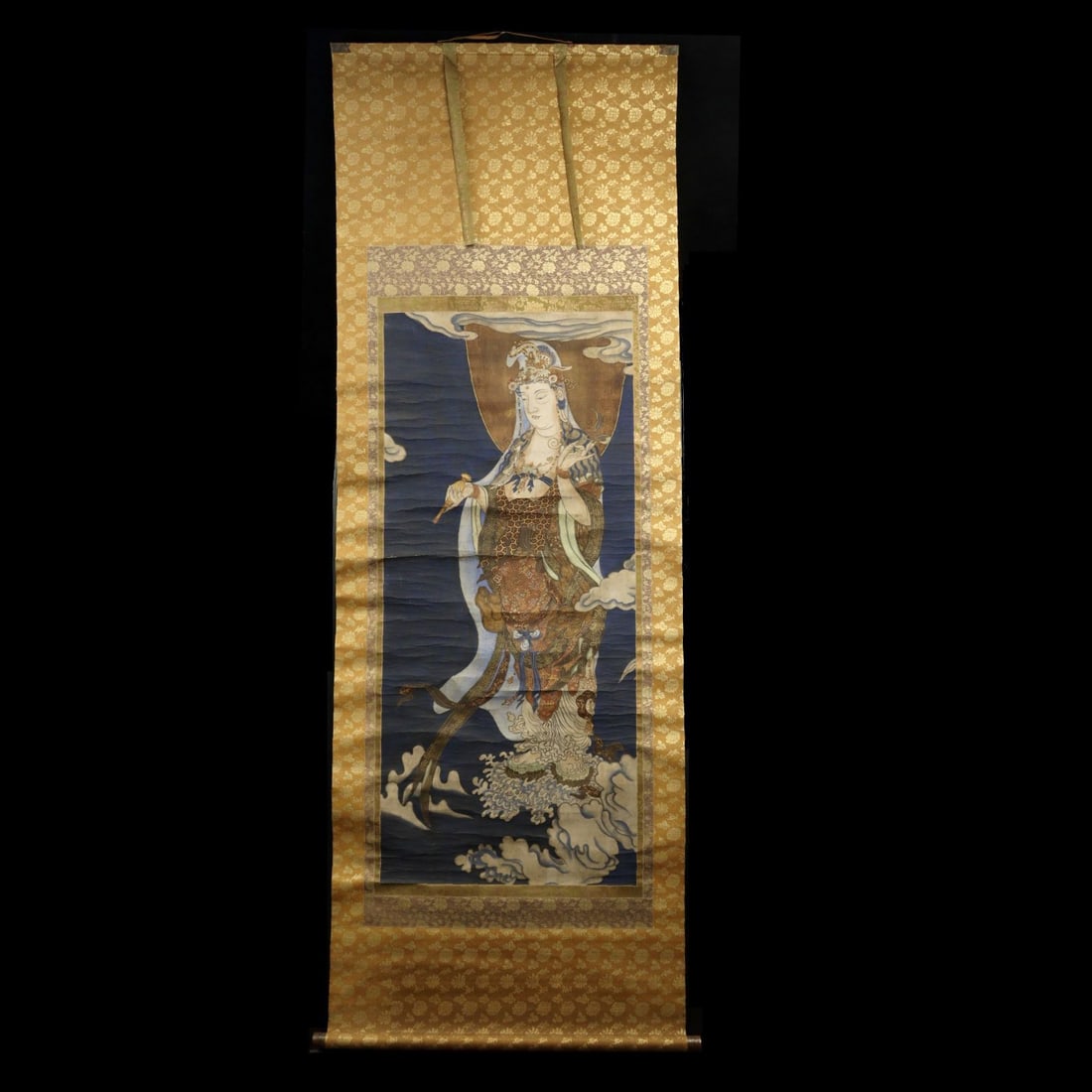 "Image of Bodhisattva Guanyin, the Great Compassionate Savior", hand-painted on paper scroll.: A hand-painted scroll of Bodhisattva Avalokiteshvara, the embodiment of great compassion, on paper, a Buddhist art piece.(Image size) Height: approximately 133.5 cm, Width: approximately 59.5 cm(Frame