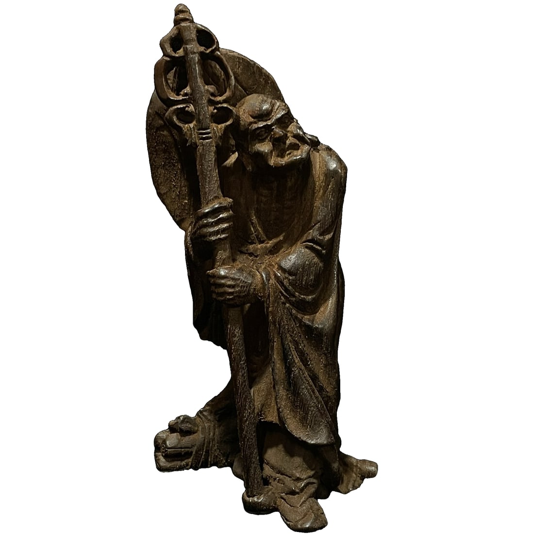 Old Tibetan carved aloeswood figurine of Arhat: Old Tibetan carved aloeswood Arhat ornament Specifications: 20cm in height, 10cm in width, weight: 101g Description: Made of precious old aloeswood, carved in the likeness of an Arhat, with clear oil