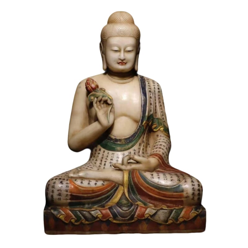 Han white jade painted Buddha statue: Han white jade painted Buddha statue The hand-drawn Diamond Sutra measures 70 cm in height, 50 cm in width, and 40 cm in thickness, and weighs approximately 200 catties.