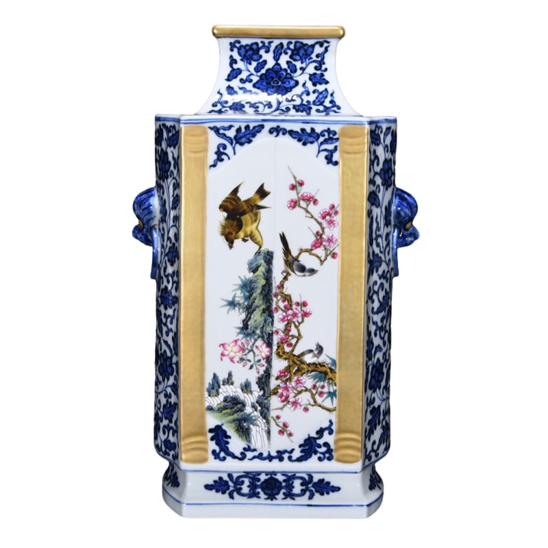 Qianlong period blue and white famille rose gilt open window vase with flower and bird design.: This is a Qing Dynasty Qianlong period blue and white famille-rose gilt openwork vase, measuring 32 cm in height and 15 cm in diameter. The vessel has a dignified and straight shape, with a square and