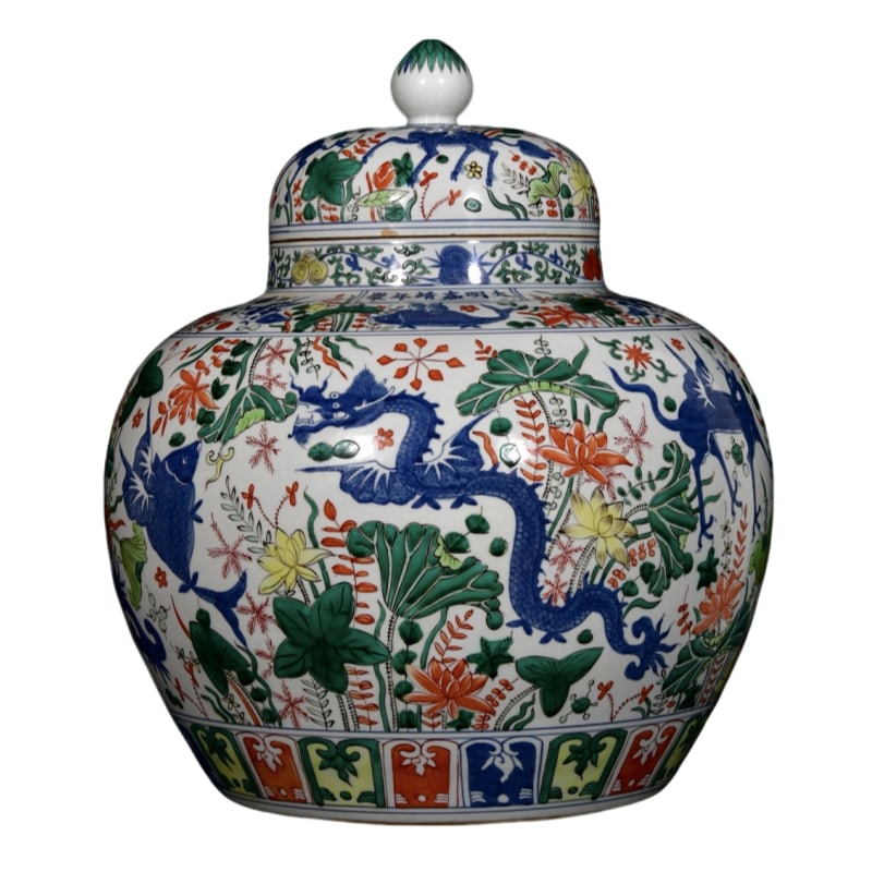 Ming Dynasty Jiajing five-colored auspicious beast pattern covered jar: During the Jiajing period of the Ming Dynasty, there was a multicolored auspicious beast-patterned covered jar, measuring 50x43 centimeters. The jar has a solid and round shape, full and plump, with a
