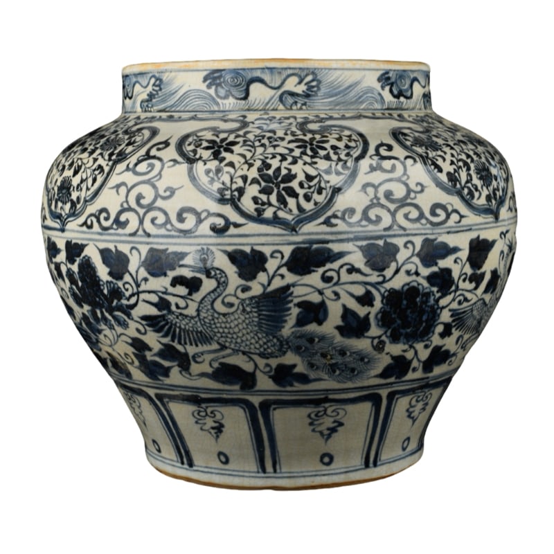 Yuan Dynasty Blue and White Porcelain Jar with Ruyi, Peacock and Peony Design: This blue and white peacock and peony decorated jar with a ruyi patterned shoulder measures 29.5×34 centimeters. The shape of the vessel is solid and full, with a round and bulging body, slightly nar