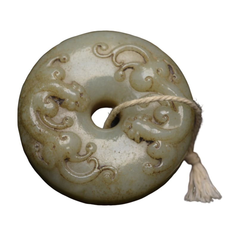 Hetian Jade Dragon Pendant: Hotan Jade Dragon Pendant Specifications: 5.1×5.1×1.6 cm, weight 70 grams. The jade is delicate and warm, with exquisite and elegant craftsmanship, showing superb carving skills. The patina is