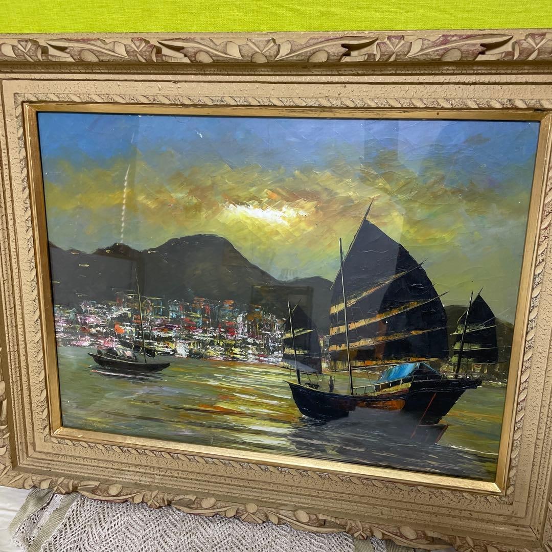 An oil painting depicting the ocean and a ship. (1 of 4)