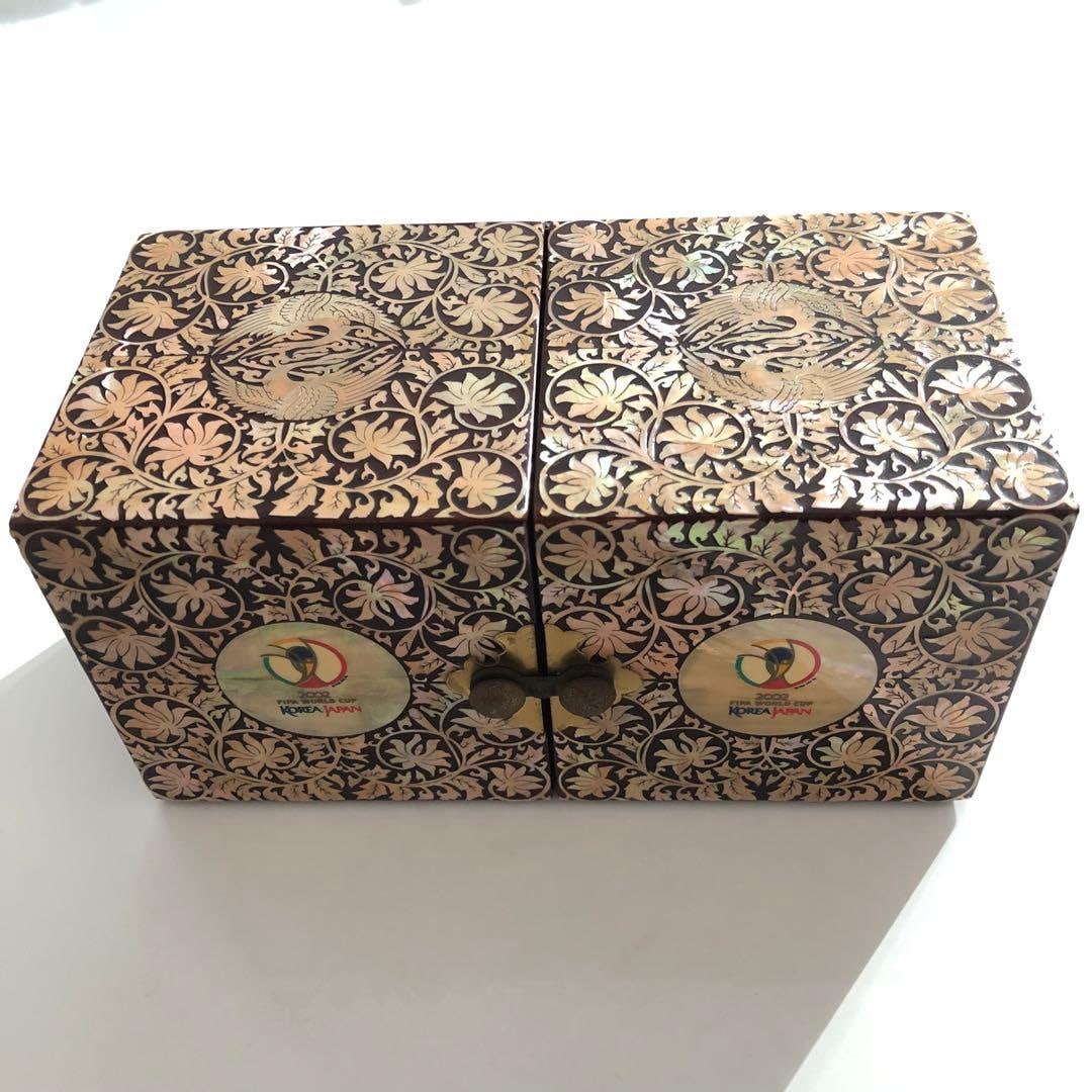 A mother-of-pearl inlaid jewelry box from Korea, commemorating the 2002 FIFA World Cup. (1 of 10)