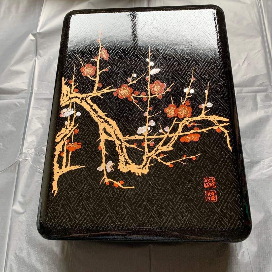 Lacquer Document Box with Plum Blossom Design: Writing Box, decorated with golden plum blossoms on a black ground. Design: Black background adorned with patterns of golden plum blossoms and branches Technique: Lacquerware Interior: The