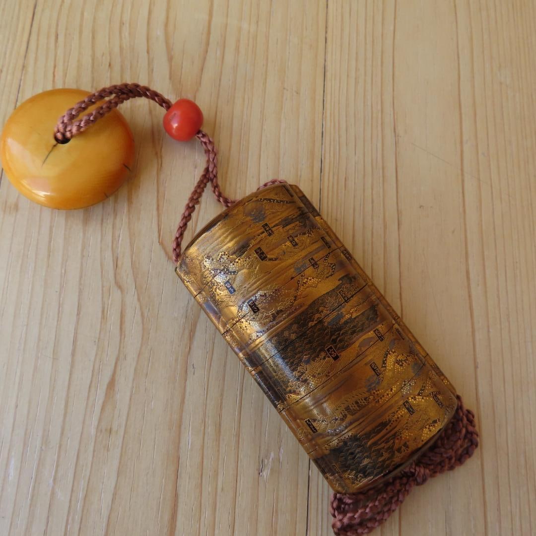 Museum-quality exhibit: A gold lacquer inrO (small container) and netsuke (miniature carving) from (1 of 20)