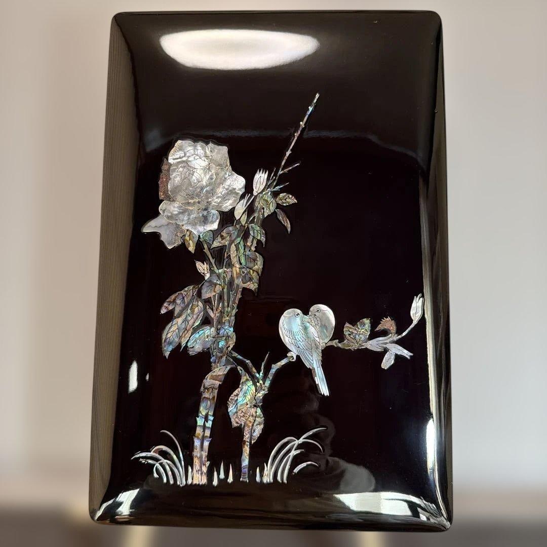 A black lacquer box inlaid with mother-of-pearl. (1 of 10)