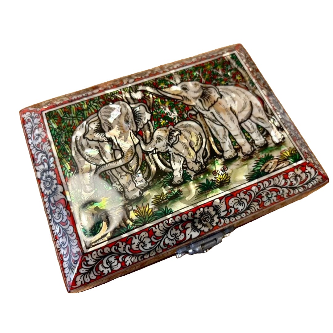 A small wooden jewelry box in the shape of an elephant, inlaid with mother-of-pearl. (1 of 6)