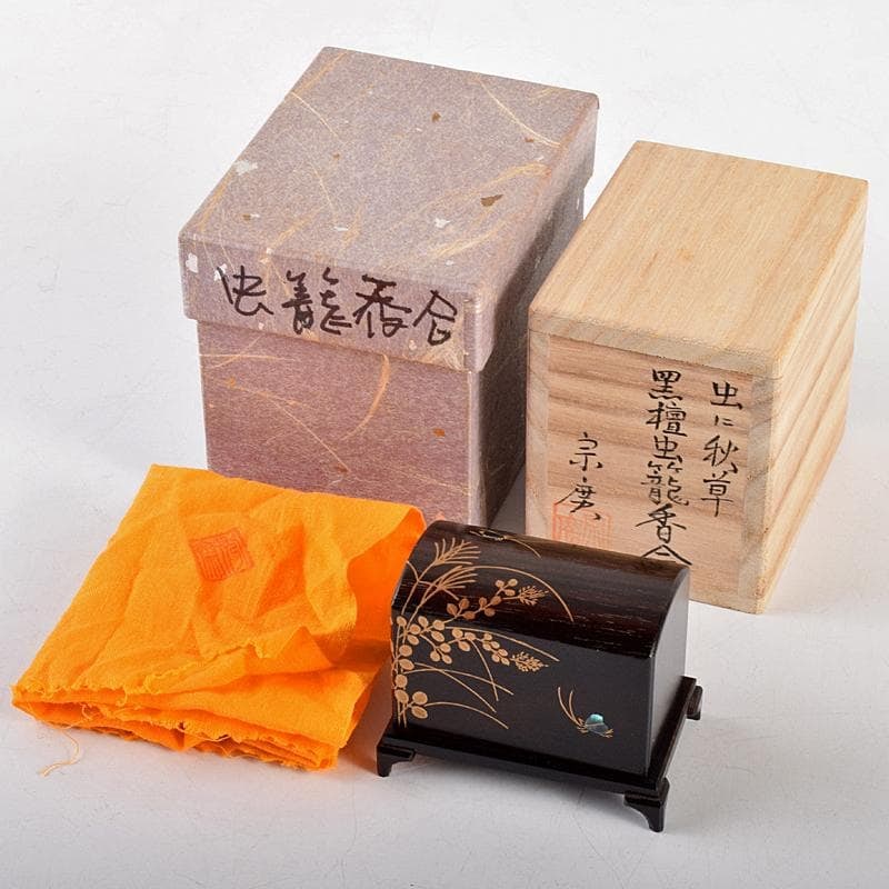 Tea Ceremony Utensil: Incense Box with Insect and Autumn Grass Pattern by Michiyuki YudOjO.: Tea Ceremony Utensil: An incense box with an insect and autumn grass pattern, crafted by Michiyuki YudOjO. Made of ebony lacquer, it features an insect cage design and comes with its original box. Dim