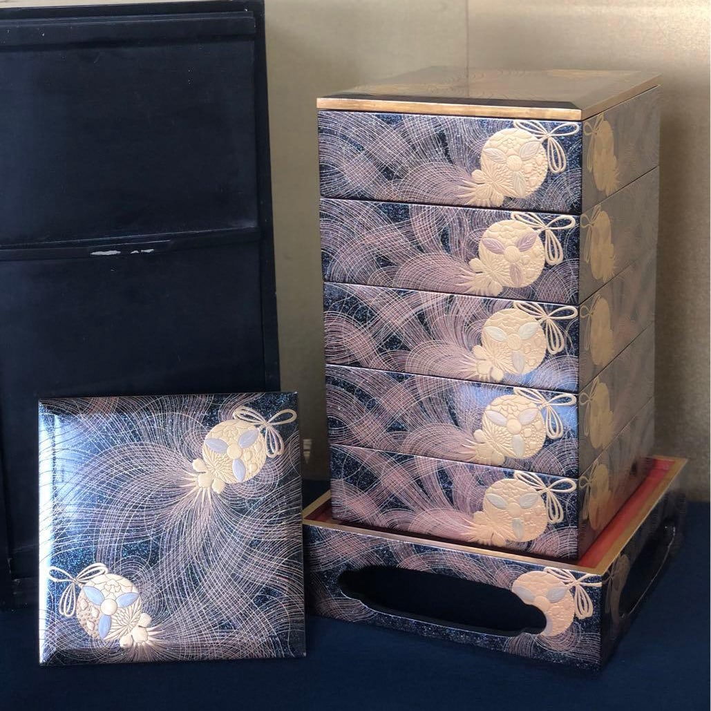 A five-tiered bento box with pear skin lacquer, featuring black and vermilion interiors. (1 of 17)