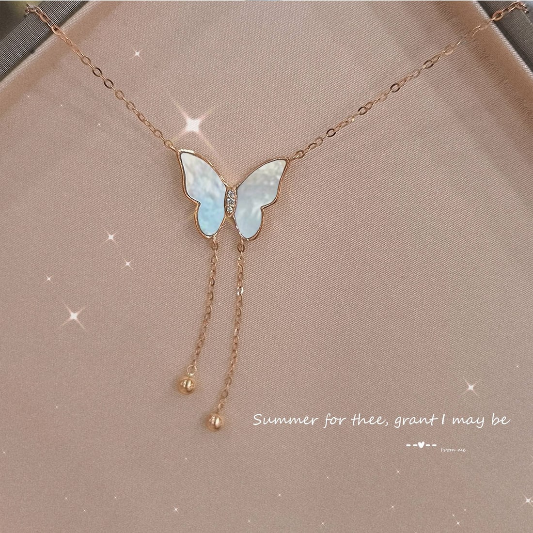 18K Gold Natural White Mother-of-Pearl Diamond Necklace: This 18K Gold necklace features natural white mother-of-pearl and diamonds, exuding a cool white sheen and natural texture. The design combines rich gold with perfectly round mother-of-pearl, showcasi