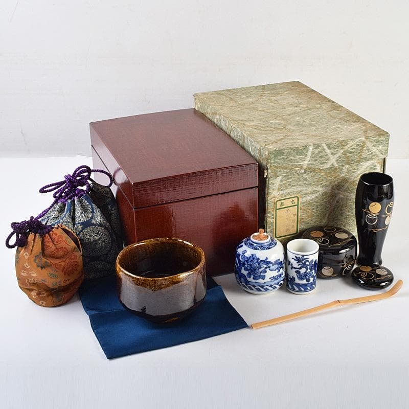 Tea Ceremony Set: Comprising eight pieces, including a Rikyu tea box wrapped in fabric, an: Tea Ceremony Set: Comprising eight pieces, including a Rikyu-style tea box wrapped in fabric, an amber-glazed tea bowl, and a tea caddy, complete with protective cloth covers. Dimensions (Tea Box) App