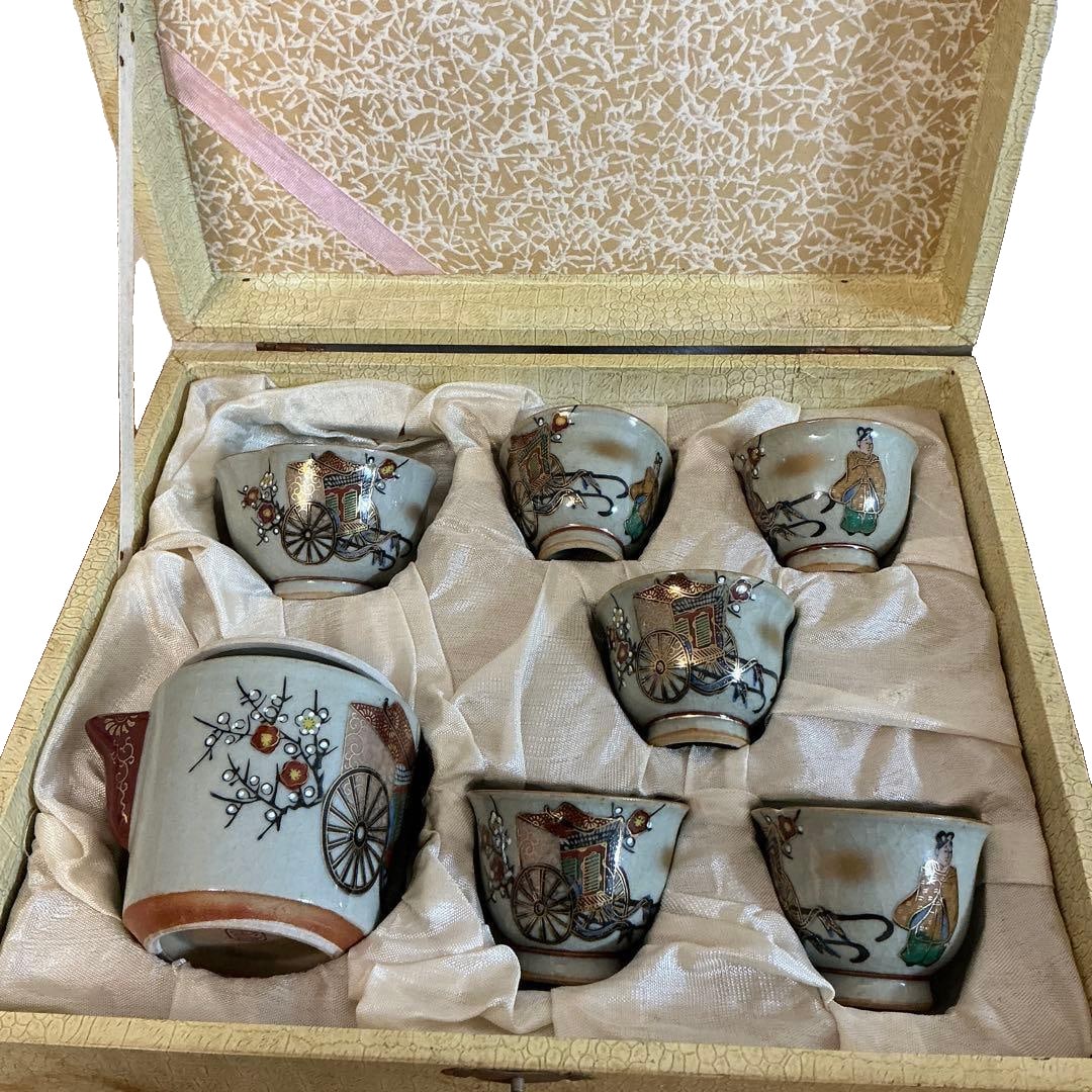 Tea Cup Set: Tea Cup Set Small Tea Cup Diameter 5 cm, Height 4 cm One Large Tea Cup Diameter 6.5 cm Height 4 cm Teapot Diameter 6.5 cm Height 6.5 cm The metal clasp on the box lid does not close properly. These