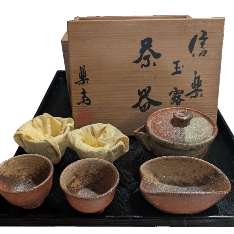 Shigaraki Ware Ceramic Tea Set: Tea Bowl and Water Cooler.: Shigaraki Ware Ceramic Tea Set: Tea Bowl and Water Cooler Tea cup used for cooling hot water Ceramic, Shigaraki Ware Color: Brown Approximate dimensions: Teapot Body diameter 7.5 cm Height 7 cm Cooled