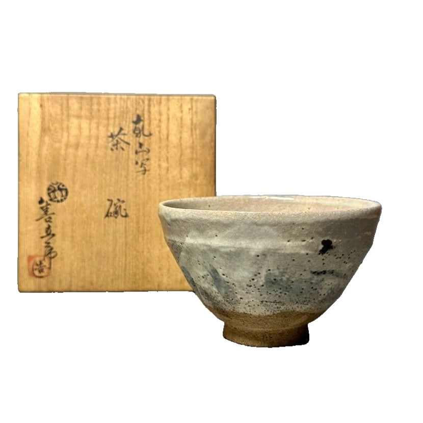 A tea bowl in the style of Eiraku Zen-gorO and Min Zen-kenzan, depicting a design of Mount Fuji,: This is a tea bowl crafted by Eiraku Zenjiro. It is created in the style of Kenzan, depicting Mount Fuji. The dimensions are a diameter of 12.7 cm and a height of 8 cm. The item is in good condition, 