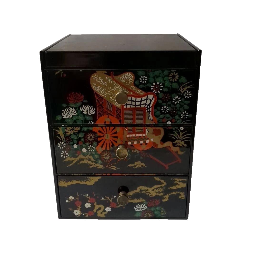 A traditional lacquered bento box with three drawers. (1 of 10)
