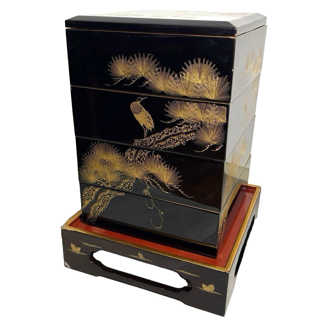 A four-tiered bento box with maki-e decoration, featuring a design of cranes and pine trees, (1 of 11)