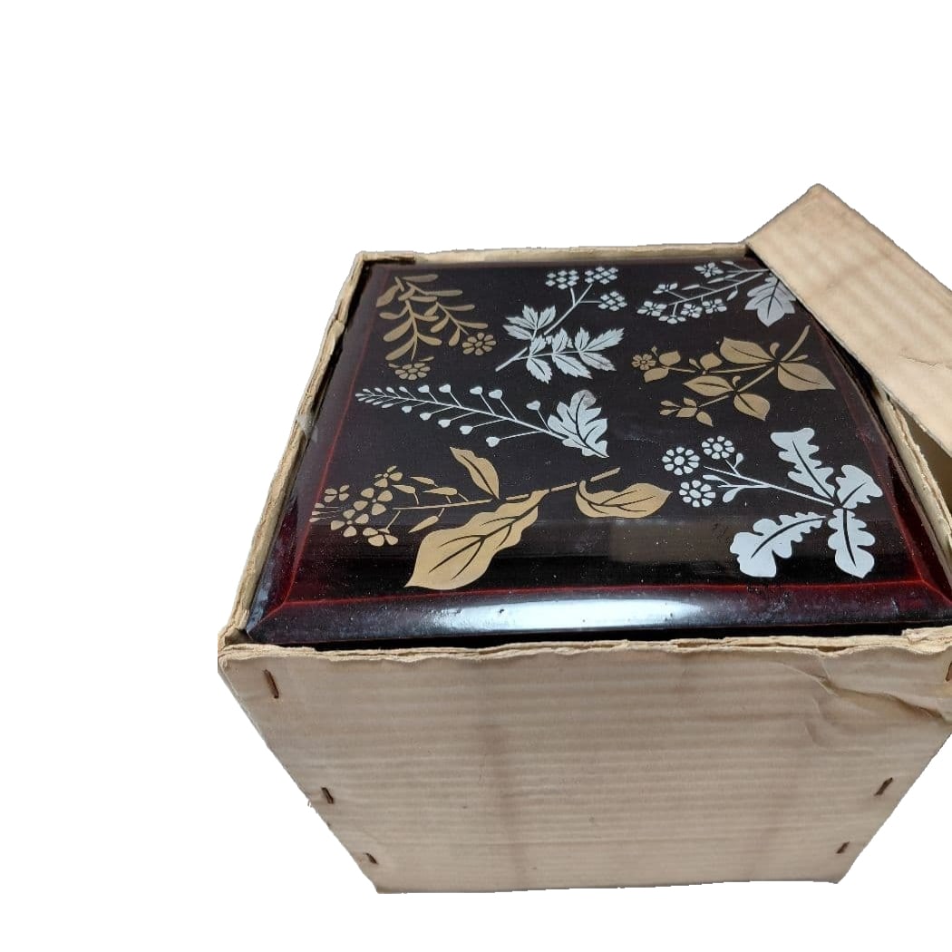 An antique three-tiered wooden bento box. (1 of 20)