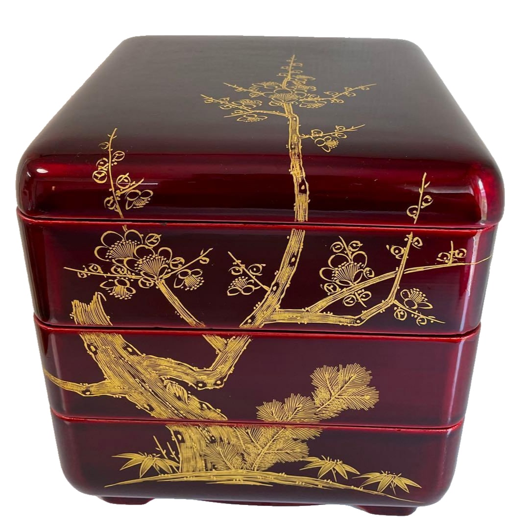 Three-tiered lacquer bento box (with case), adorned with gold inlay and iridescent sheen. (1 of 7)