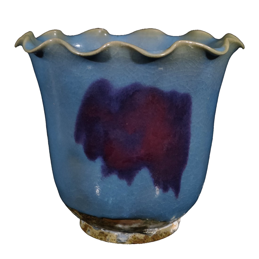 Song Jun kiln, a vermilion-colored scroll cylinder: This Song Dynasty Jun ware cylindrical jar features a wide mouth with rolled edges, showcasing a unique shape with smooth and natural lines. The glaze color is based on the typical Jun ware sky-blue g