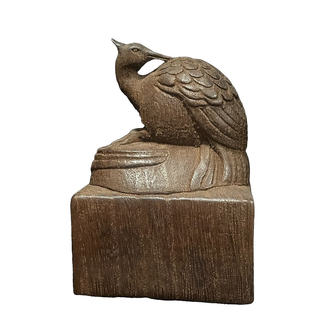 Qing Dynasty old sinking fragrant phoenix seal-style seal: Qing Dynasty Old Agarwood Phoenix Seal Height 12.5cm, Width 8.5cm, Weight 132g The seal is finely carved, with a high relief phoenix pattern, clear and vivid, exuding a majestic aura. The seal is well