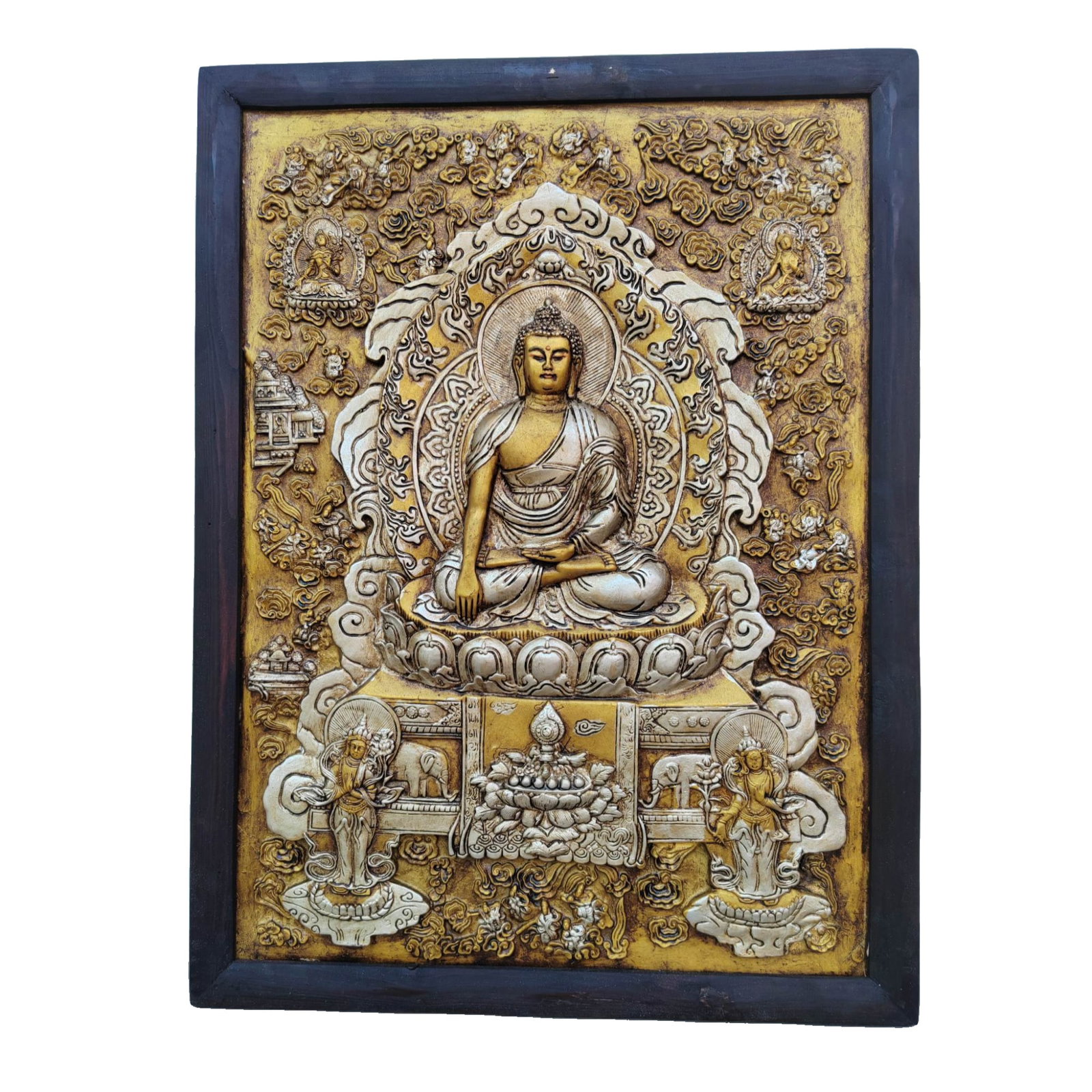 An old wooden frame holds a thangka of Buddha Shakyamuni. (1 of 10)