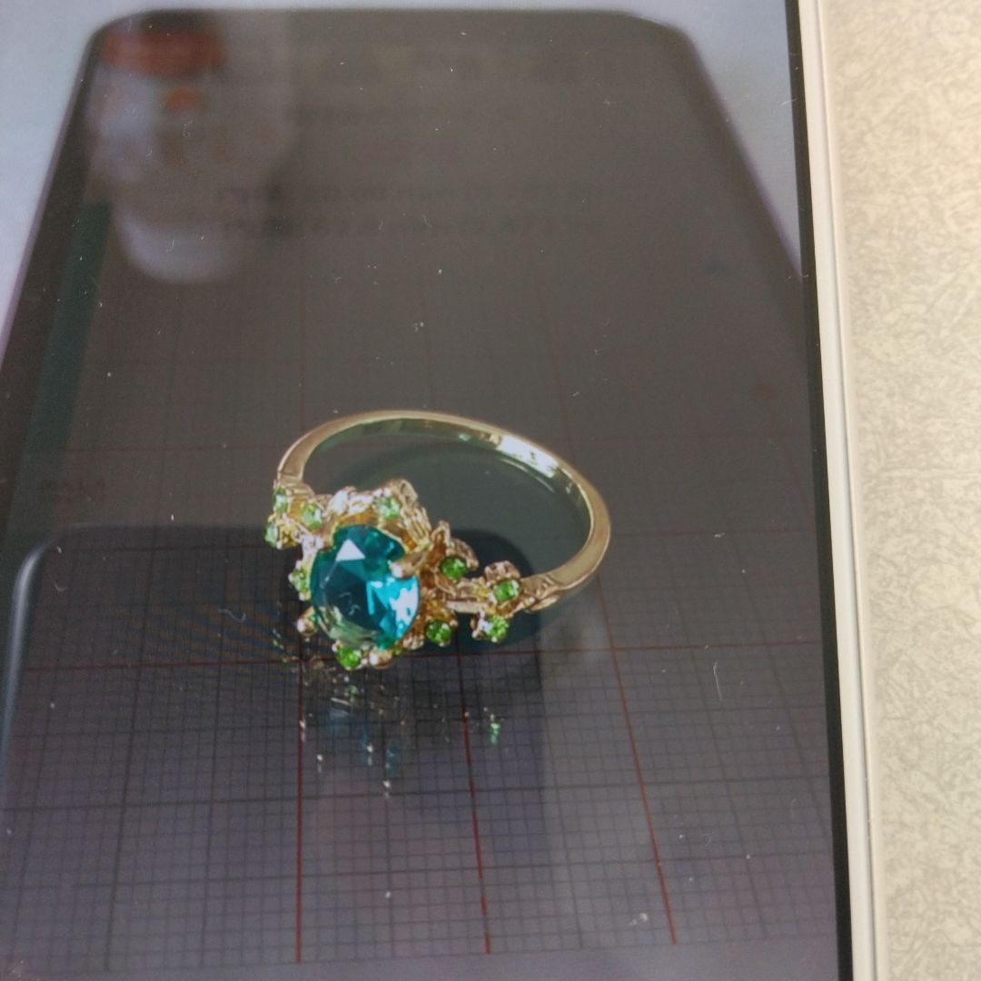 Second-hand - emerald green cubic zirconia ring, size 22, brand new and unused: Emerald green cubic zirconia ring, size 22, brand new and unused