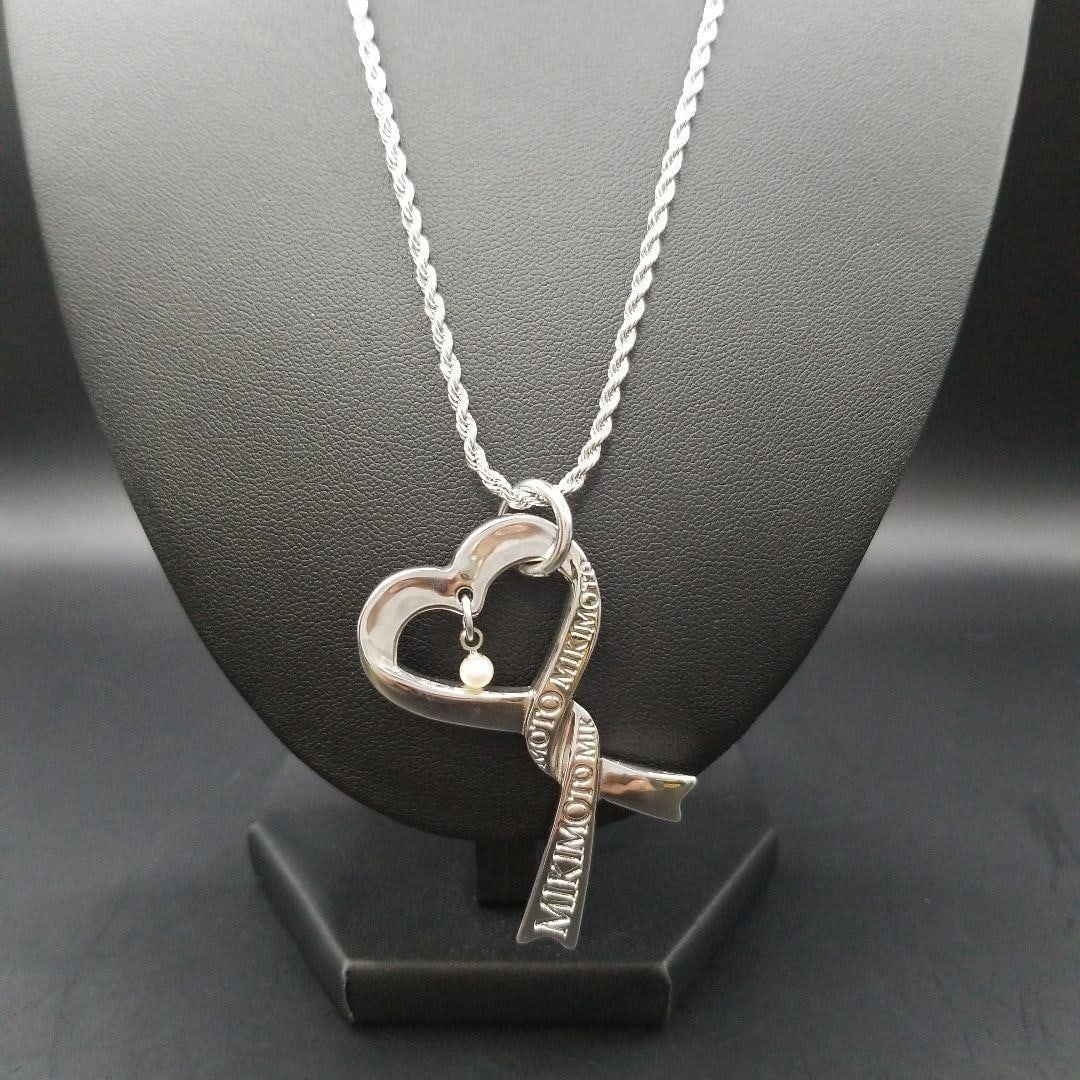 Second hand - MIKIMOTO heart-shaped silk ribbon pearl ladies necklace: This MIKIMOTO heart-shaped ribbon pearl necklace combines cuteness and elegance. MIKIMOTO accessories are known for their exquisite brand logo design. The swaying pearls shimmer with a charming
