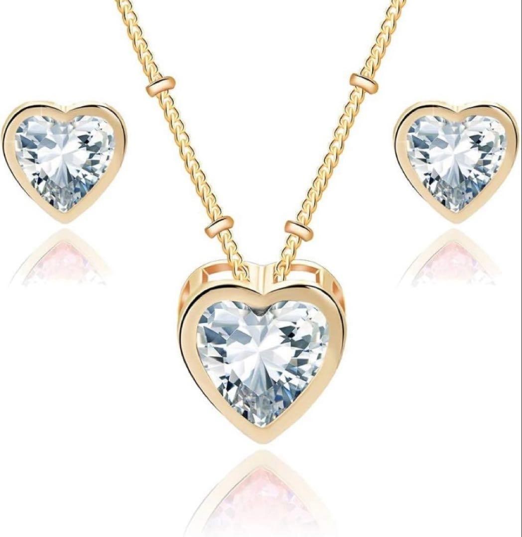 Second-hand - heart-shaped earrings and necklace set, ear studs, 18K gold plated: Material: This heart-shaped necklace and earring set is made of environmentally friendly alloy. Features: Plated with 18K gold for strong rust resistance. Gentle on the skin as it is lead and nickel-f