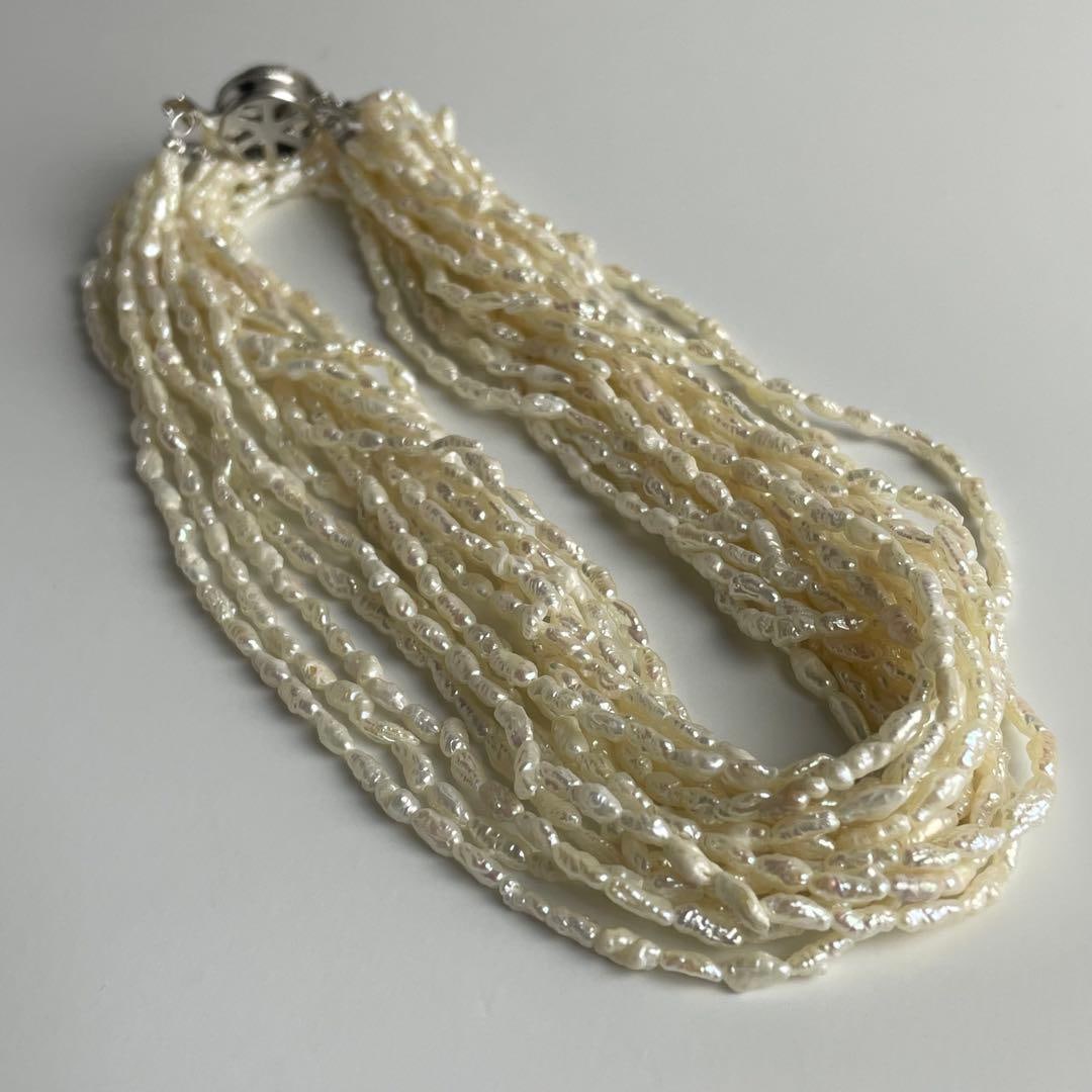 Second hand - Keshi Pearl 8-strand Necklace: Keshi Pearl 8-Strand Necklace Dimensions: Length: Approximately 60 centimeters, considered quite long. Width: Approximately 2.4 millimeters Weight: 43.3 grams