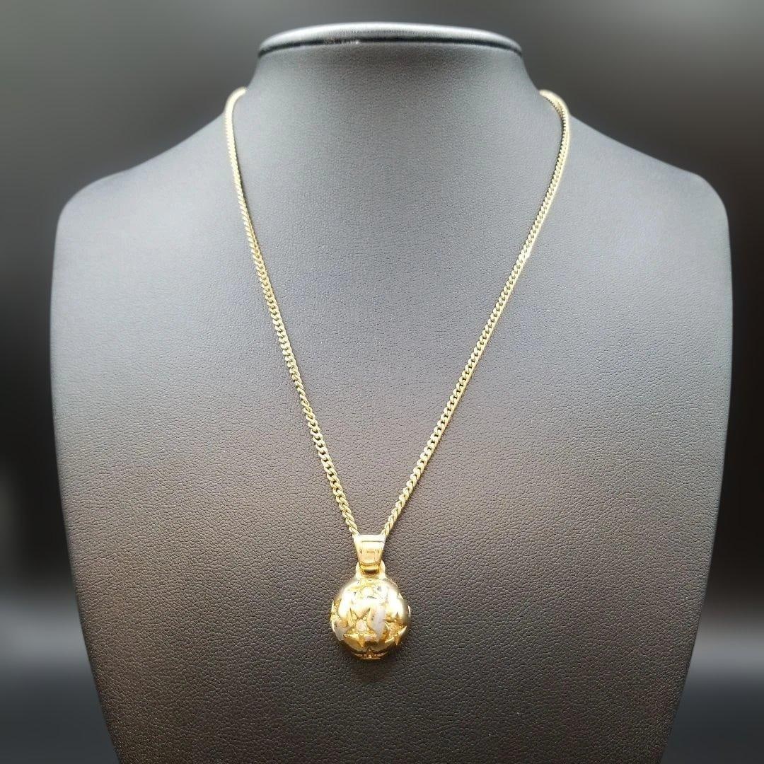 Second-hand - Givenchy star-shaped gemstone necklace, vintage: This vintage Givenchy necklace exudes an elegant glow. The gold spherical design, adorned with stars, creates a luxurious and exquisite aura. Even when paired with simple clothing, this necklace can i