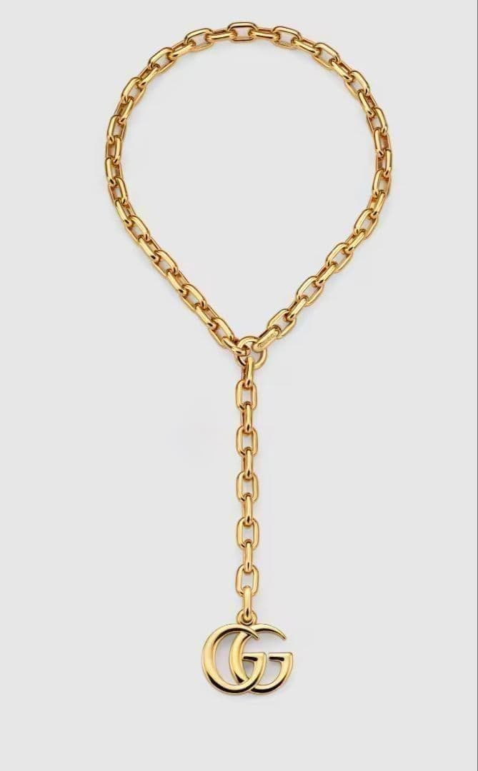 Second-hand GUCCI Double G Pendant Necklace: This is the current style of Gucci's Double G pendant necklace available for sale. The fashionable lariat-style (Y-shaped) necklace adds a touch of charm and sophistication to your neckline. Product D
