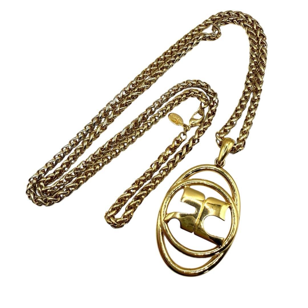 Second-hand Courrges pendant long necklace, gold-colored: Brand Name: Gao Xue Print: Paris Courreges Color: Gold Top Dimensions: Approximately 5.3 cm x 3.5 cm Chain Length: Approximately 94 cm About the Product This is a long pendant necklace from Courreges,
