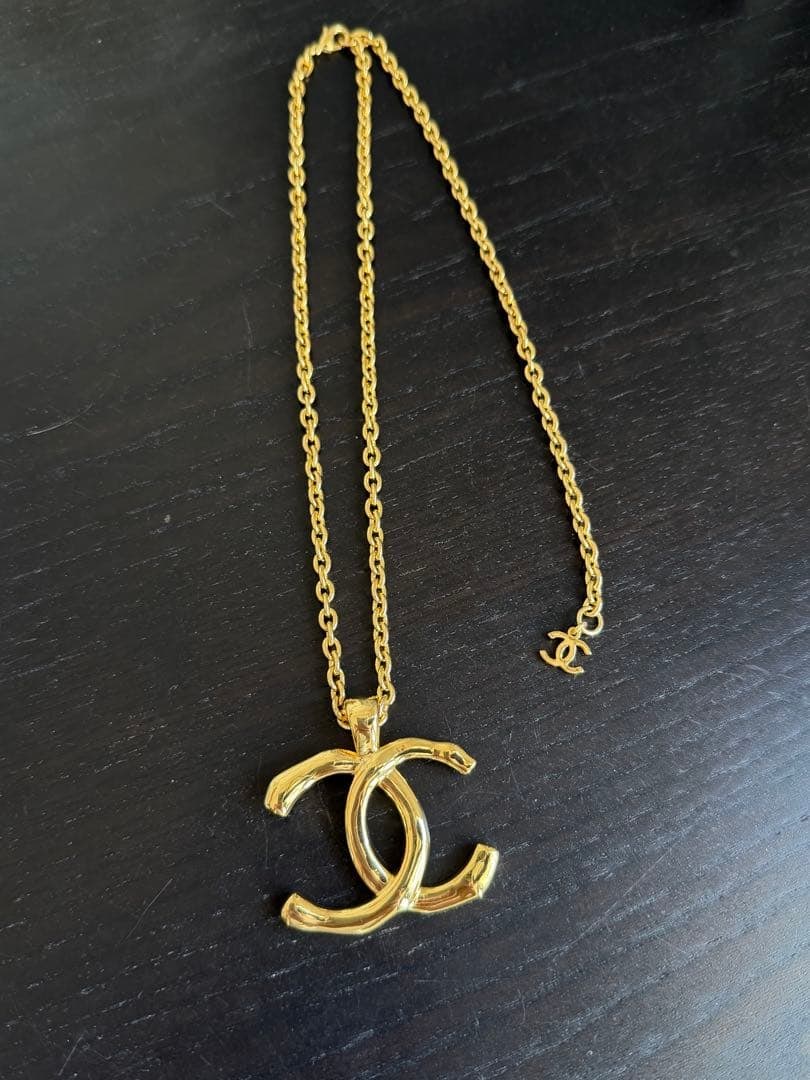 Second-hand - Chanel CC Necklace: This is a Chanel necklace purchased approximately three years ago. This necklace is gold in color, and the chain length can be adjusted in two different settings. You can choose to wear it in a