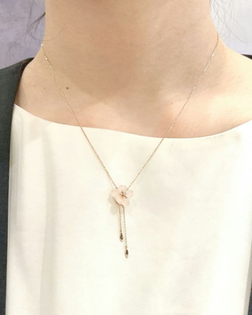 Second-hand - Brand new unused Star Jewelry 10k gold cherry blossom necklace: This is a brand new, unused Star Jewelry Sakura Necklace. All sales receipts are included. Product Description This limited edition jewelry from Star Jewelry features soft cherry blossom pink pearls
