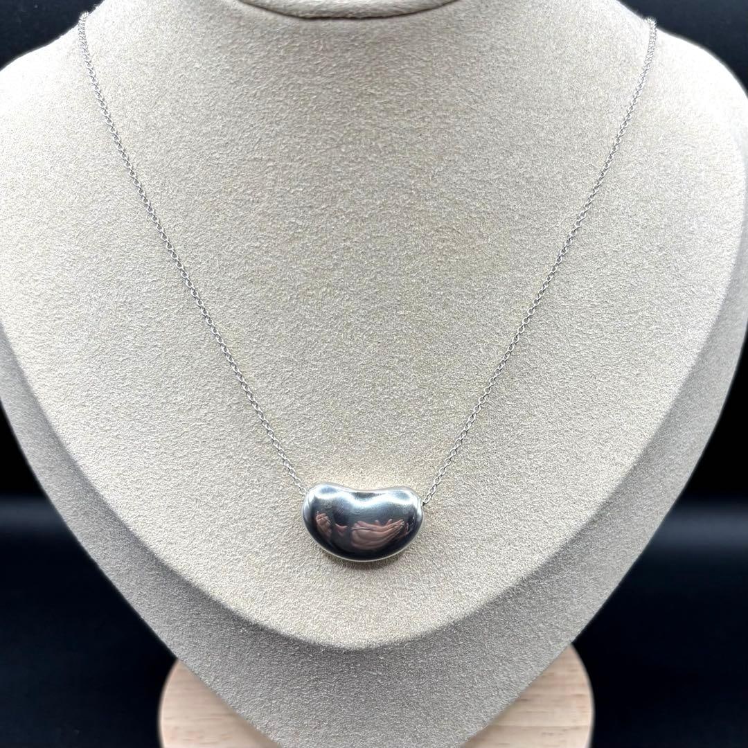 Second-hand - Tiffany & Co. Bean Large Necklace, 2.13mm, 925 Sterling Silver: Tiffany & Co. Bean Large Necklace, 2.13mm, 925 Sterling Silver, comes with a dust bag and a certificate of authenticity. In the "Bean" series, this bean is heavier, with a width of approximately 2.13 