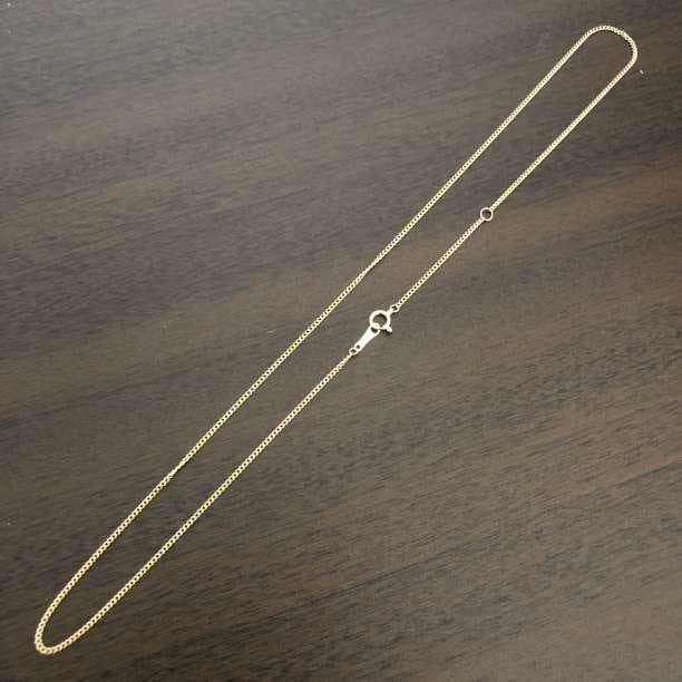 Second-hand - Cuban link necklace/45 cm/K18: Cuban Link Necklace/45cm/K18 "Length" 45cm (adjuster at 40cm) "Width" 1mm Weight Approximately 0.95g "Material" Made in Japan, K18 (stamped with K18) Product Description This is a top-quality product 