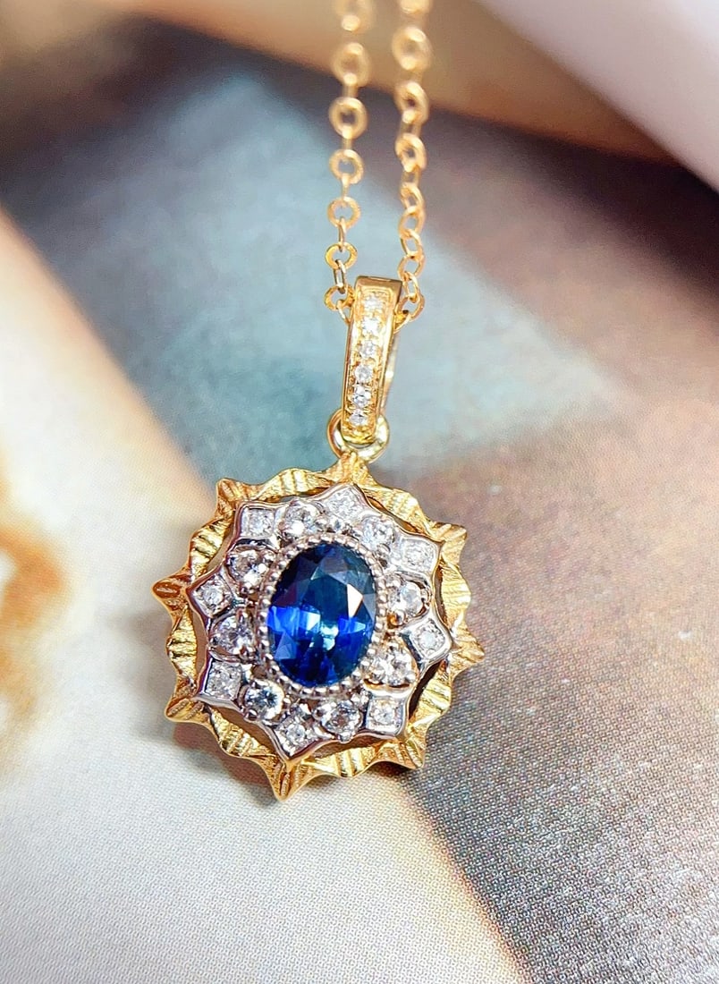 18K Gold Sapphire Pendant (chain not included): This pendant is meticulously crafted in 18K gold, paired with royal blue sapphires, exuding a rich vintage charm. The deep hue of the sapphires resembles the stars in the night sky, enchanting the beh