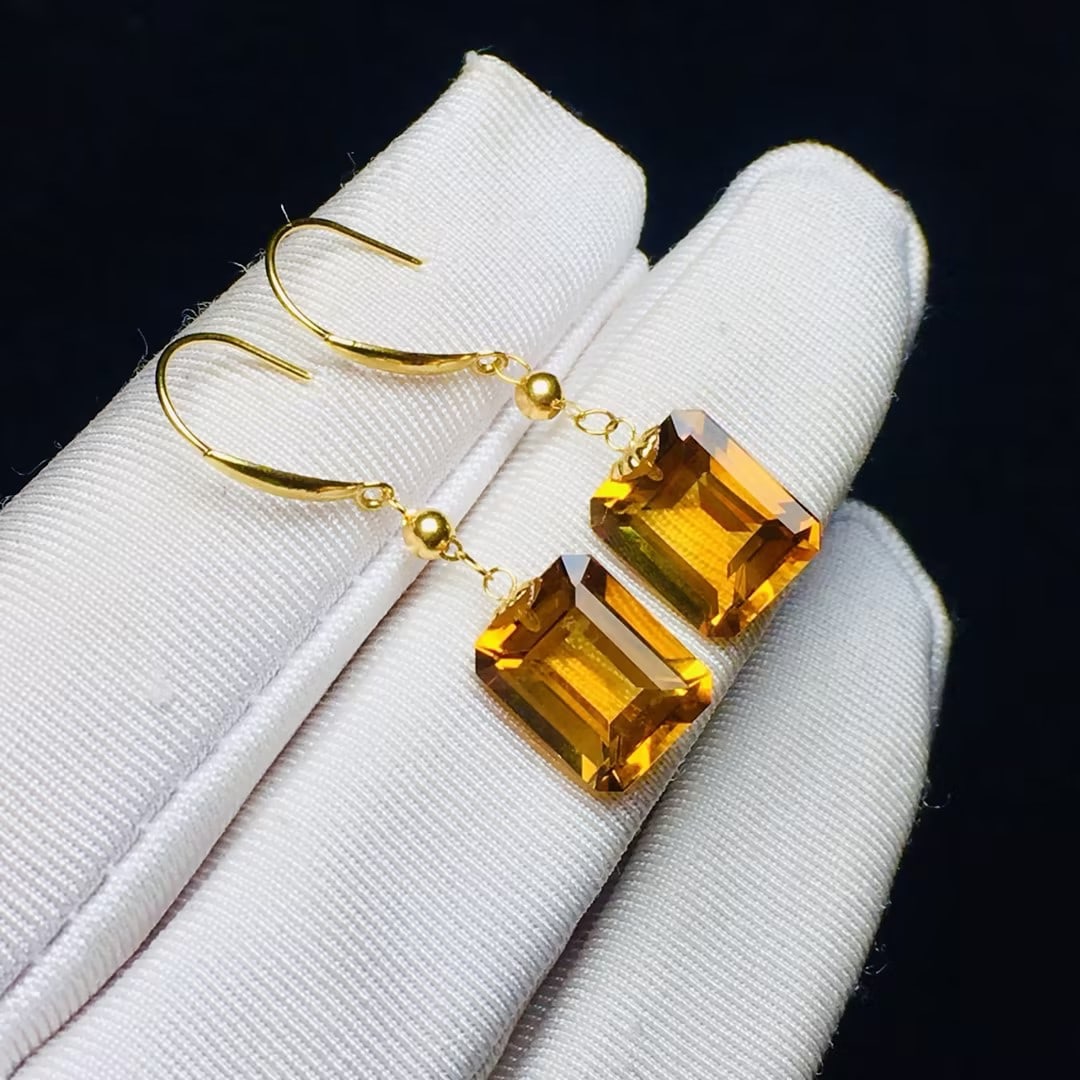 Natural citrine earrings: These natural citrine earrings are set entirely in 18k gold. The color is exquisitely beautiful, and the crystals are crystal clear and pure. Citrine is associated with wealth and career success. Wear