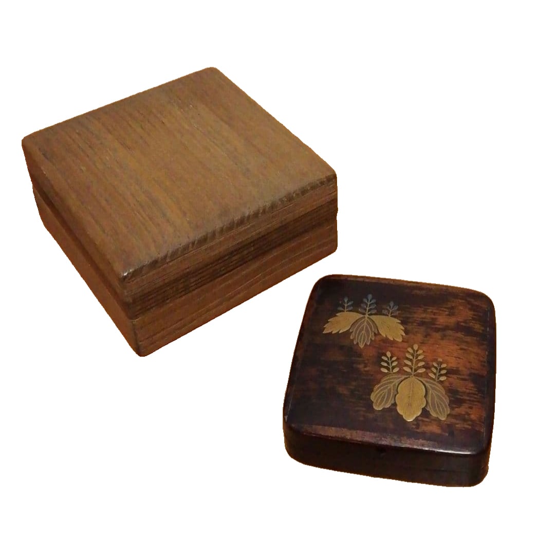 Lacquer incense box made by Tamagawa, decorated with wave and wheel patterns. (1 of 13)